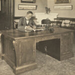 President MacLaurin sitting at the desk presented by the Technology Club of New York, 1917