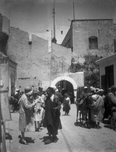 Europeans and Moroccans in front of Bab Dar Dbagh, ca. 1920