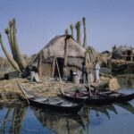View of sarifas (traditional reed houses) on marshes of Iraq. circa 1930-1960 by photographer Kamil Chadirji