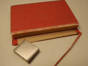 Book with spine cloth cut away