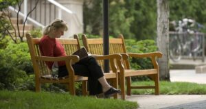 Woman reading on bench