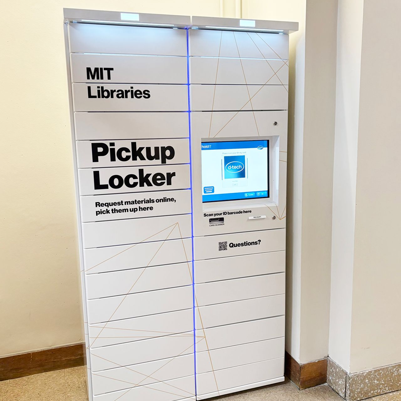 A white, two-column locker with a digital screen and text reading "MIT Libraries, Pickup Locker"