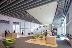 View of information desk at Hayden Library, looking east