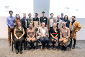 Two rows of people pose for a picture at the 2023 MIT Prize for Open Data event.