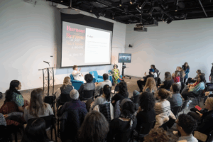 Emily and Amelia Nagoski speaking at an MIT Reads event