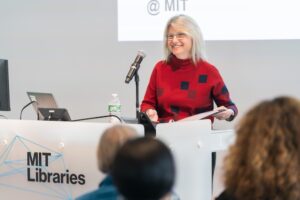 Sally Kornbluth at a podium