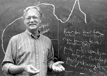 Kenneth Hale at a blackboard