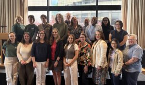 Two rows of library staff pose for a group photo