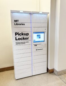 White two-column locker with screen and text reading "Pickup Locker."