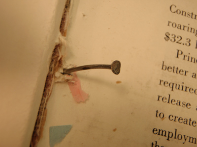 Nail used to bind journal volume